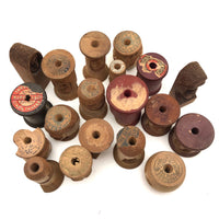 Curious Lot of Heads Hand-carved from Old Spools