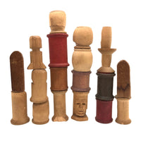 Curious Lot of Heads Hand-carved from Old Spools